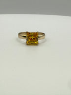 14k yellow gold princess-cut yellow sapphire ring, front view of square gemstone