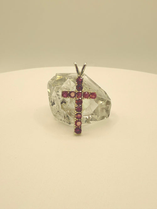 10k yellow gold ruby cross pendant with prong-set ruby gemstones and top bail loop