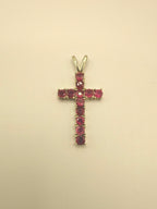 10k yellow gold ruby cross pendant with prong-set ruby stones and two-prong top loop