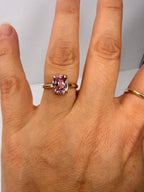 14k yellow gold ring with cushion-cut peach sapphire on slim band