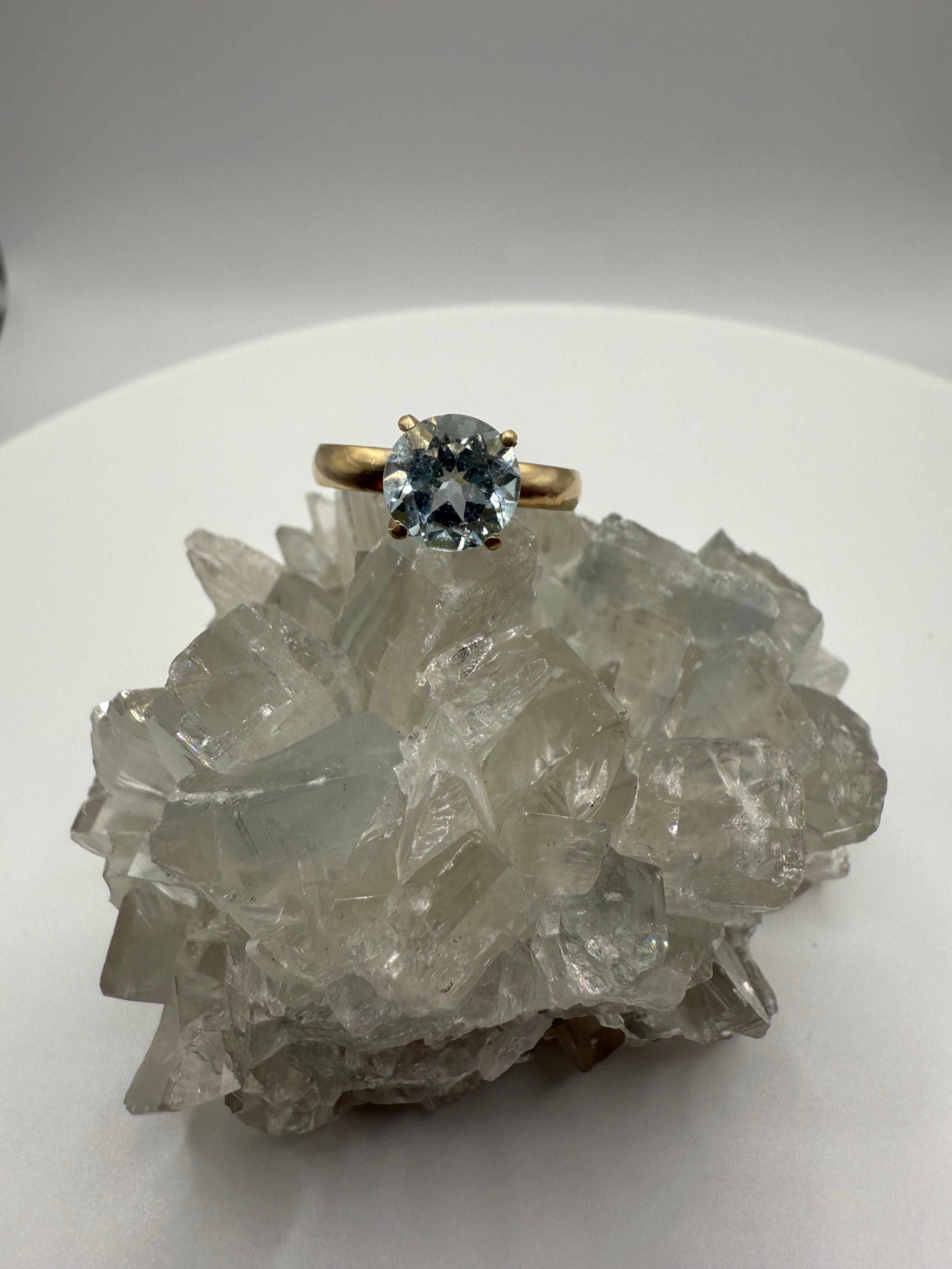 14k Solitaire Round Aquamarine Ring.