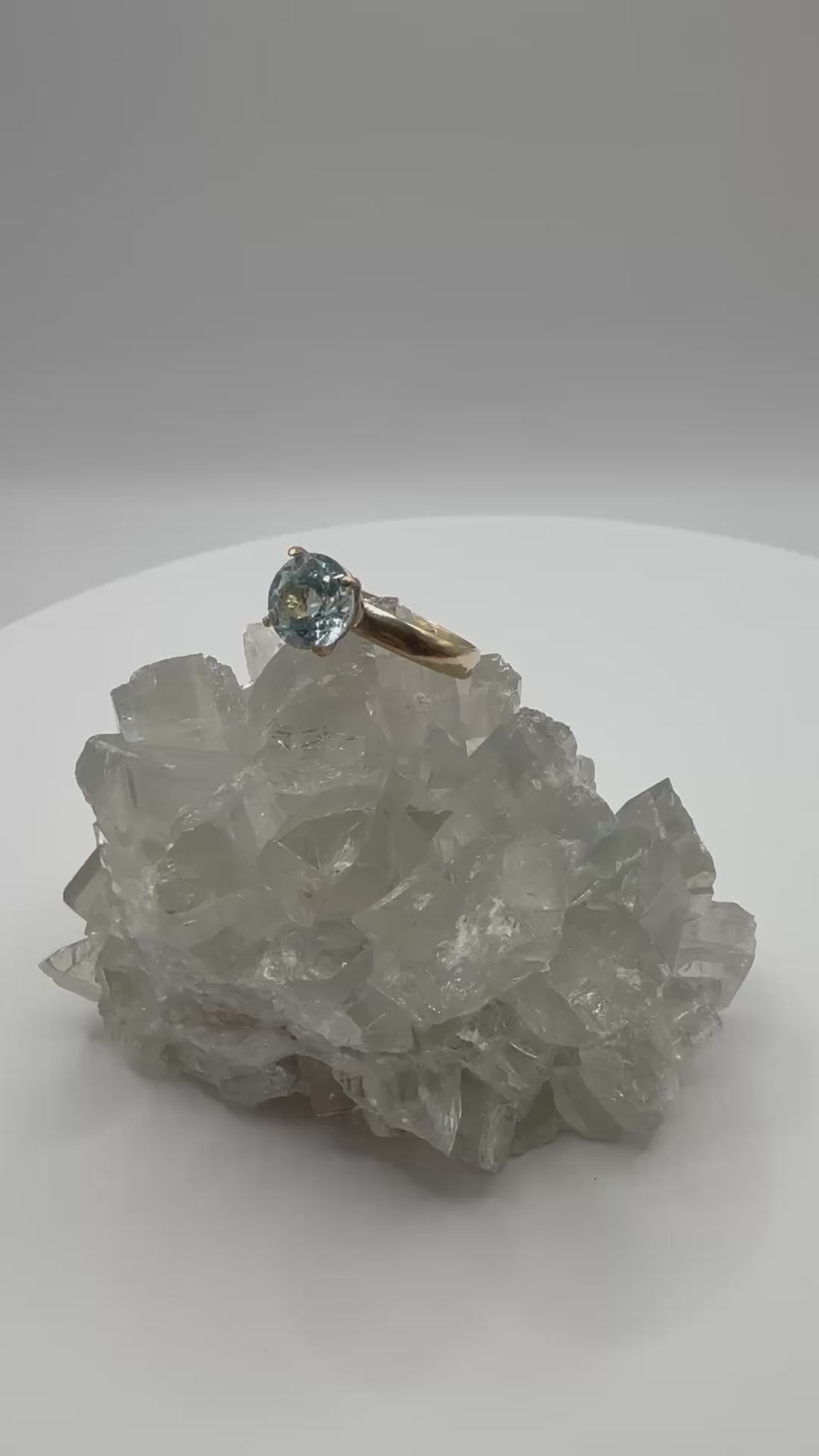 14k Solitaire Round Aquamarine Ring.