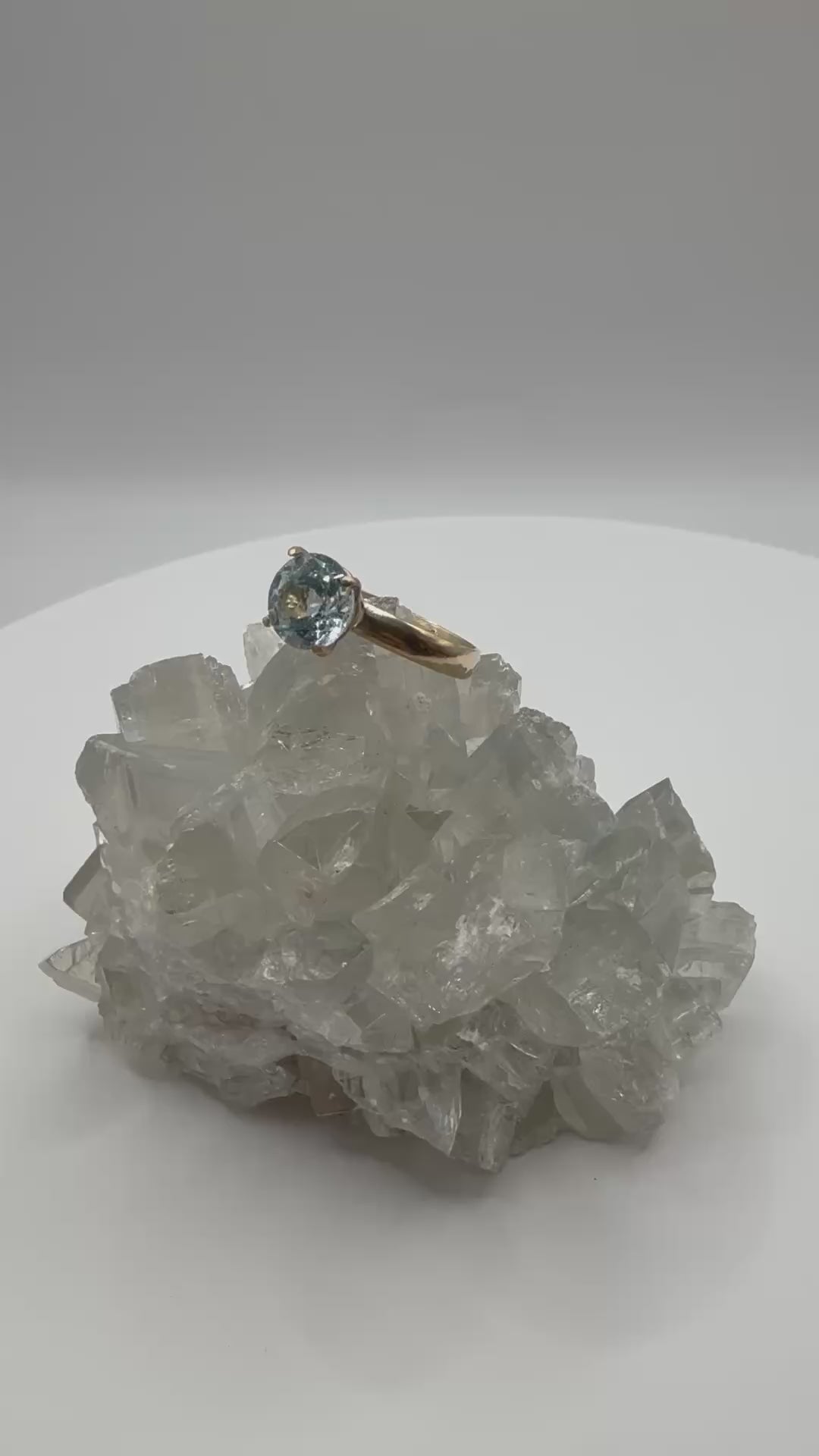 14k Solitaire Round Aquamarine Ring.