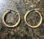 Pair of textured 10k solid gold round hoop earrings with latch backs